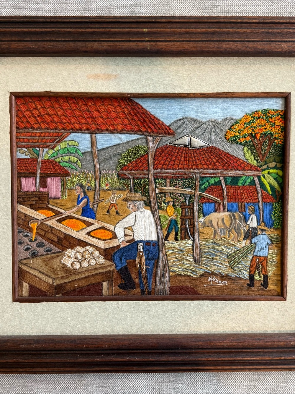 Miriam, Sugarcane HaciendaHandcrafted Rural Harvest Textile Art - Orange and Blu
